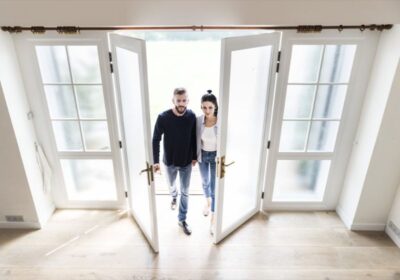 couple entering a house